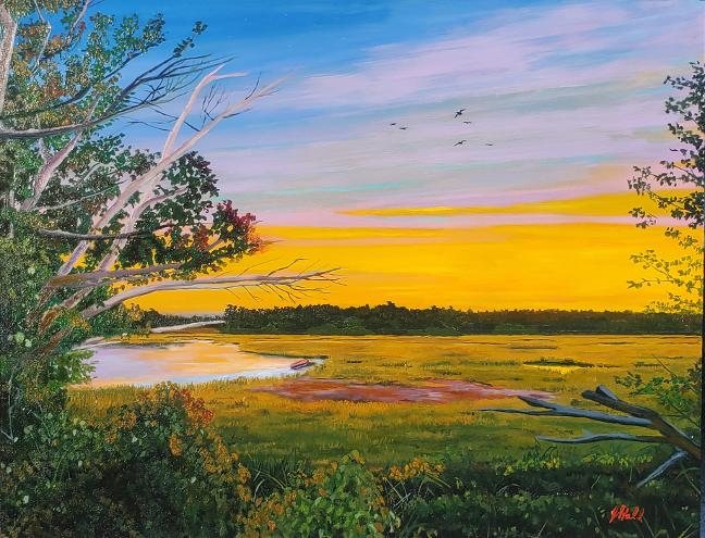 A coastal salt marsh at sunset with a golden tidal creek, birds, and a leaning bare tree